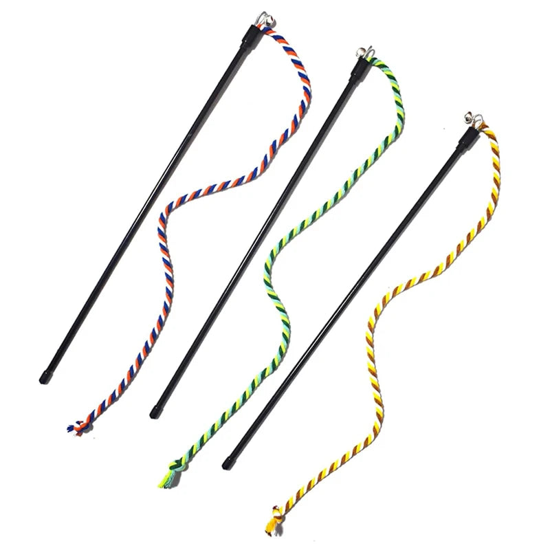 Three whips with colorful braided Indoor cat playing with interactive rope wand toy handles on a white background