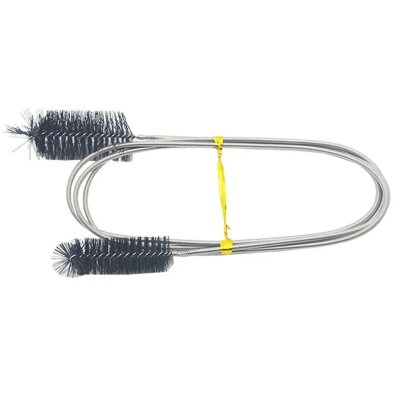 Metallic BBQ brush with black bristles on a white background. Long tube brush for cleaning fish tank and water fountain accessories.