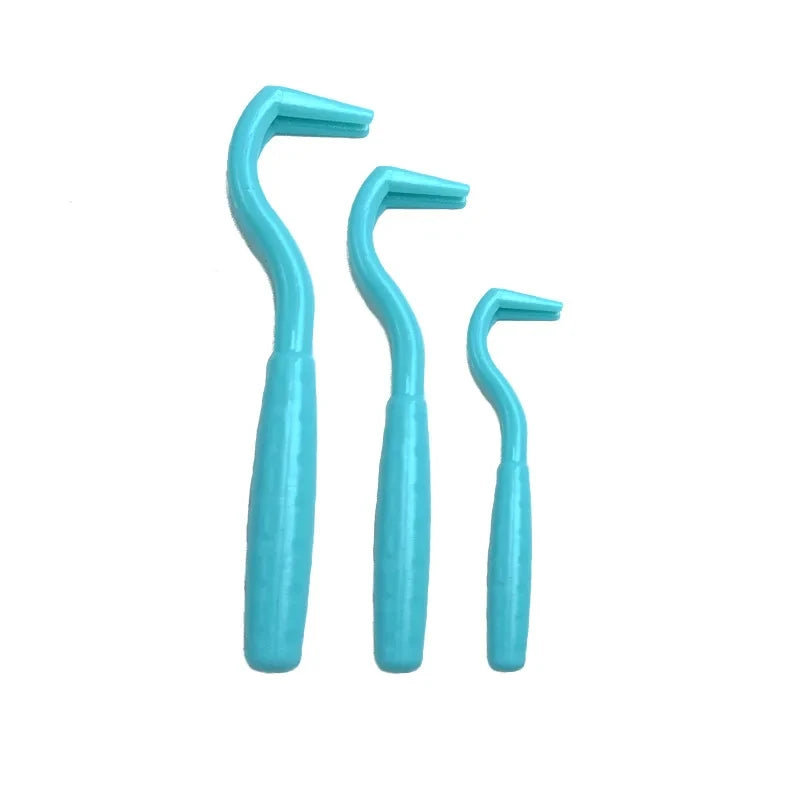 Three blue metal hooks of different sizes on a white background -Tick remover tools for maintaining a healthy pet coat.