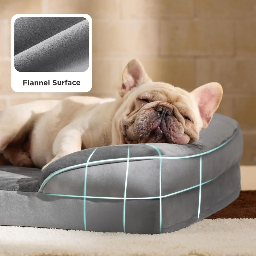 Dog lying on a gray pet bed with flannel surface, close-up of fabric texture. Waterproof orthopedic dog bed medium.