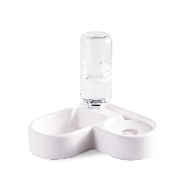 BPA-free corner pet feeder for indoor pets. White ceramic pet water and food bowl on a white background