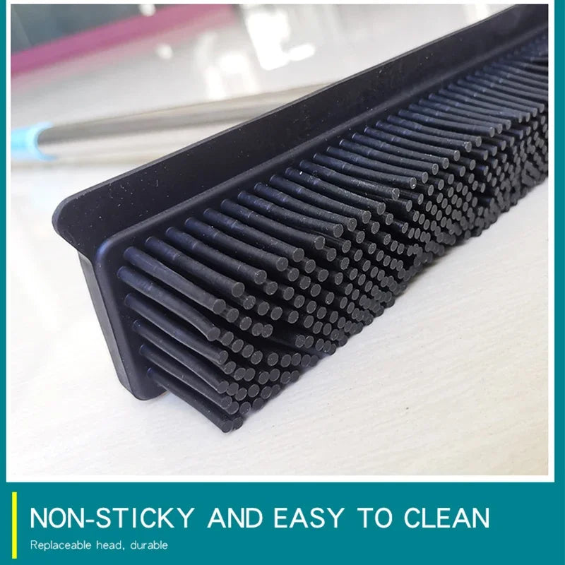 Close-up of rubber bristle broom head designed to collect pet hair, lint, and debris.