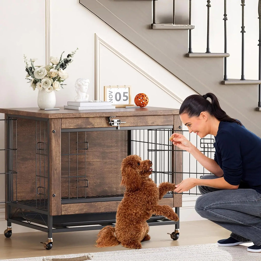 Woman petting a dog in front of a wooden pet crate with wheels, heavy duty indoor dog kennel.