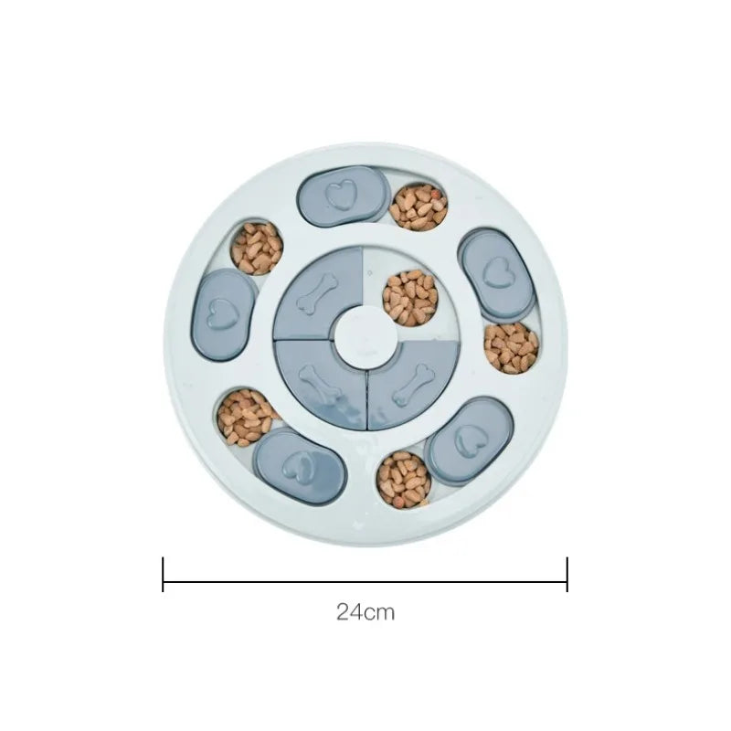 Round pet treat dispenser with food compartments. Dog enrichment toy with hidden treat compartments.