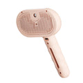 Pink pet grooming brush on a white background - Pet hair cleaning brush designed for cats, dogs, and small animals.